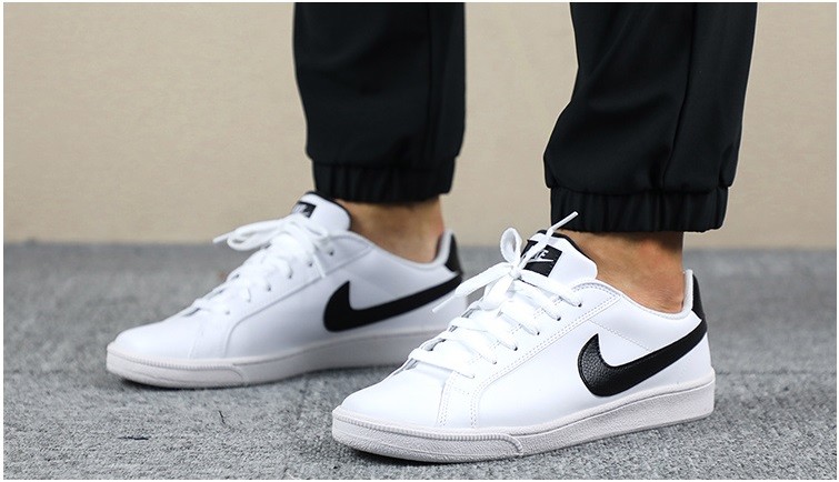 nike white trainers black tick